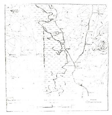 Study the map and answer the question. The land-form feature at the centre of the map can best be described as
